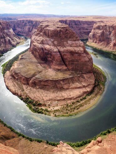 Tourists visiting a scenic overlook at a national park