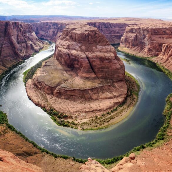 Tourists visiting a scenic overlook at a national park