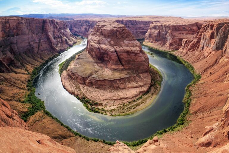 Tourists visiting a scenic overlook at a national park
