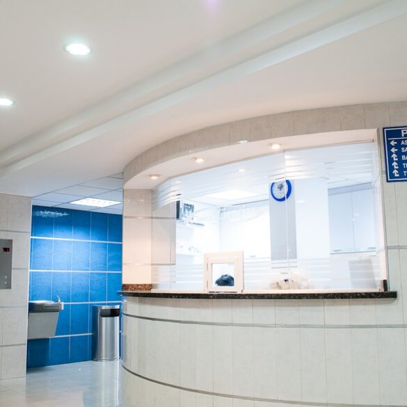 Modern hospital building exterior with emergency entrance