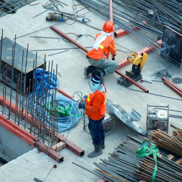 Construction crew working on underground water infrastructure repair