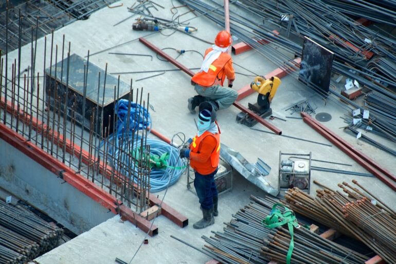 Construction crew working on underground water infrastructure repair