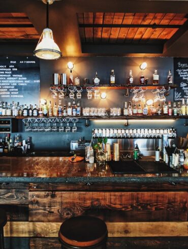 Cozy restaurant interior with warm lighting and rustic decor